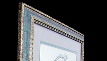 This is a close-up look at the frame for this pen & ink art based on mermaid lore.